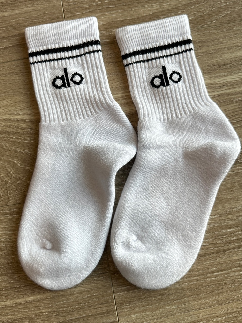 ALO Yoga White Crew Athletic Socks with Black Stripes and Logo